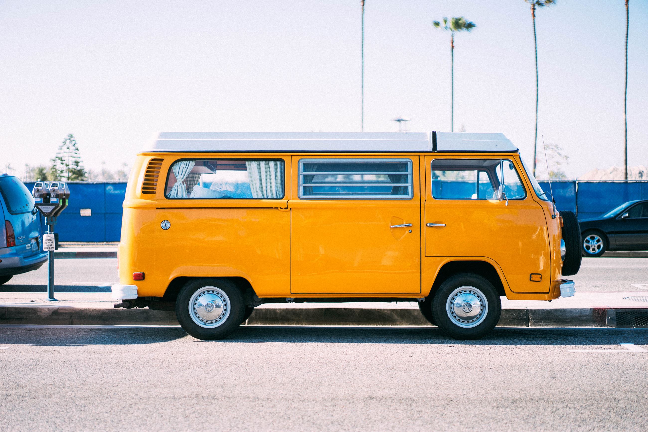 Curbside Van Photo by Herson Rodriguez on Unsplash